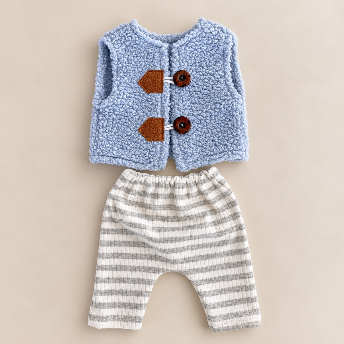 Light blue textured vest with white and gray striped pants newborn boy photography outfit
