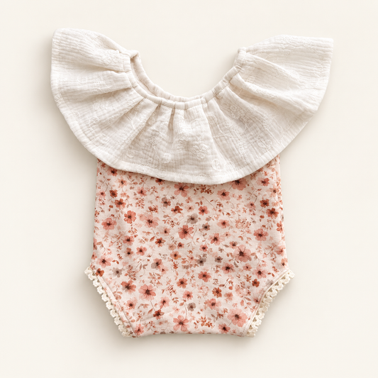 Blush pink floral newborn photography romper with oversized ivory embroidered muslin ruffle and cream lace trims