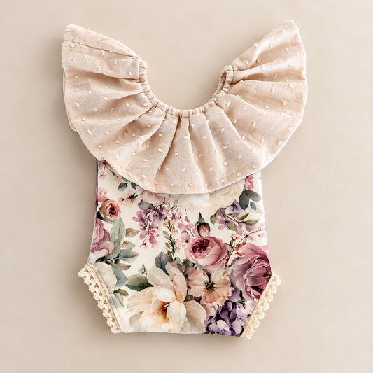 Blush floral newborn photography romper with ruffle collar and ivory lace trim