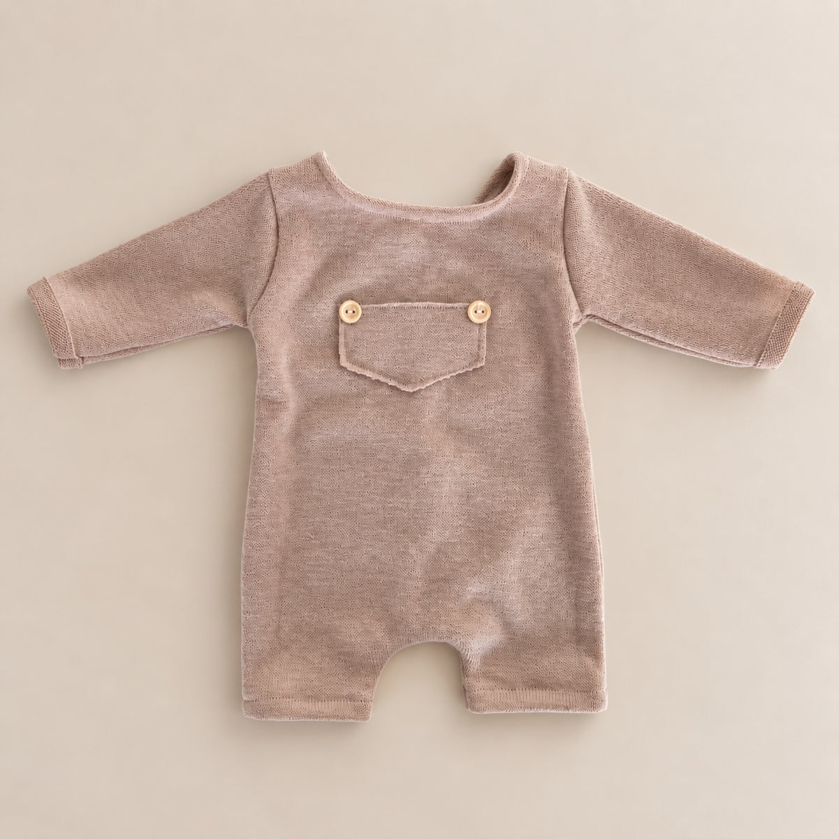 Taupe beige long sleeve newborn romper with front pocket and wooden buttons for newborn photography